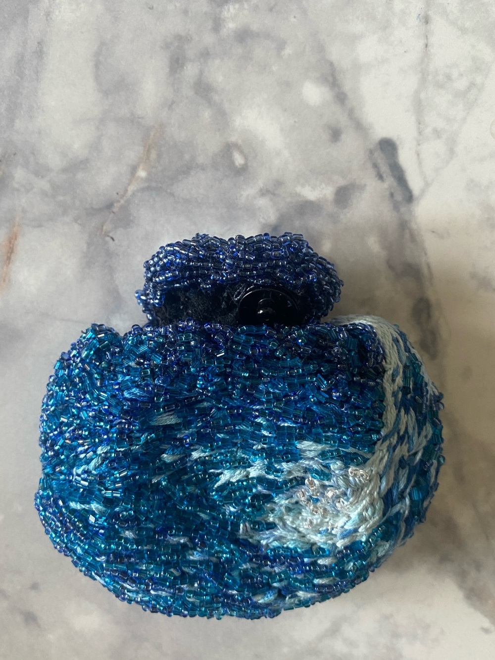 Handmade beaded coin purse using recycled materials